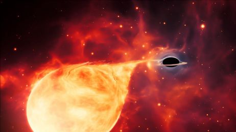 Czarna dziura połyka gwiazdę fot. ESA/Hubble, M. Kornmesser