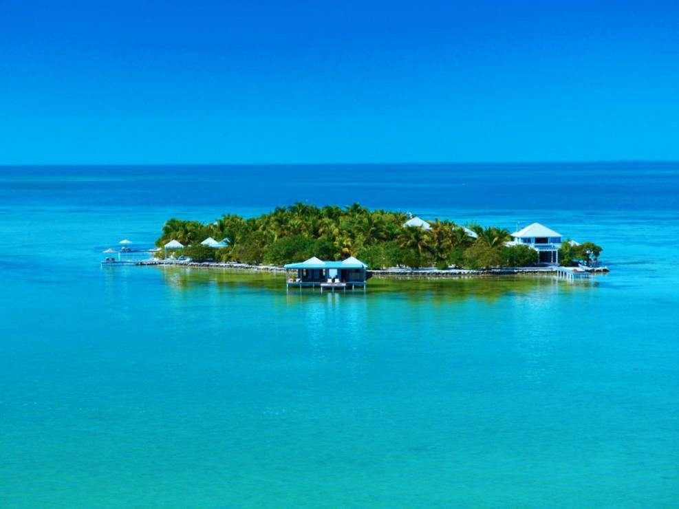 despite-its-proximity-to-both-miami-and-houston-the-private-island-of-cayo-espanto-in-belize-remains-a-hidden-gem-accommodations-here-include-a-few-beach-villas-and-an-overwater-bungalow-local-ingredients-are-used-to-prepare-personalized-me